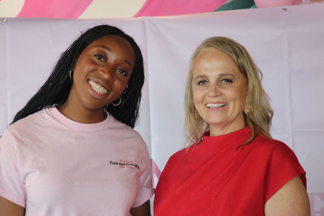 Amaris with a guest speaker at camp